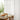 Charlotte Linen Blend Sheer Curtains showcasing their delicate linear texture as natural light filters through, providing 10-15% light blocking. These white sheer drapes are perfect for bright, airy spaces.