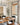 Antelope,Curtarra Dining room with woven shades with pattern curtains
