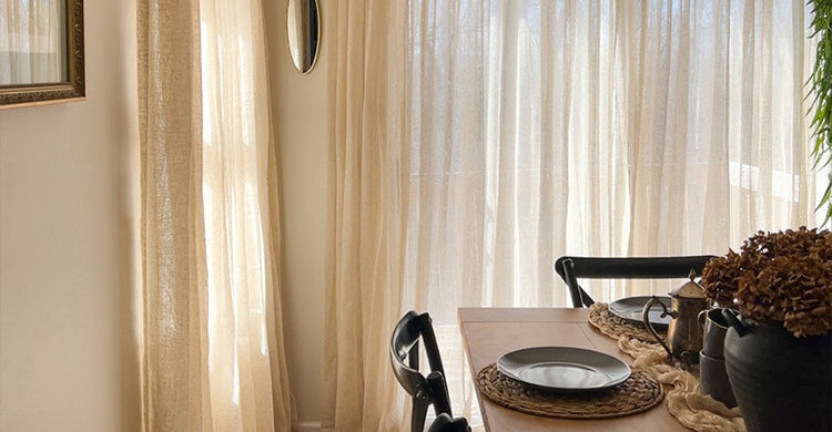 Curtarra custom semi sheer curtains softly filtering natural light in a bright and inviting living room