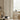 Alfred Stripe Linen Custom Curtains in a contemporary setting, showcasing their vertical woven stripes. These custom drapes, offering 40-50% light blocking, provide a natural and healthy ambiance, safe for any home.