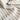 Textured Alfred Stripe Linen Custom Curtains fabric, highlighting the natural 30% linen, 70% polyester blend. The flowing material with its woven vertical stripes is perfect for custom drapery, enhancing any home with healthy, safe window treatments.