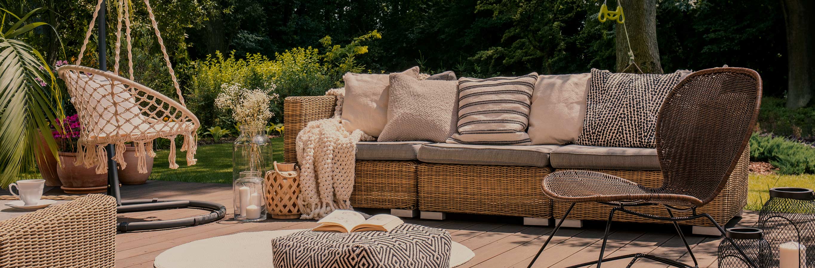 Elegant backyard deck with cozy seating, illustrating the ideal setting for enhanced outdoor privacy and ambiance.