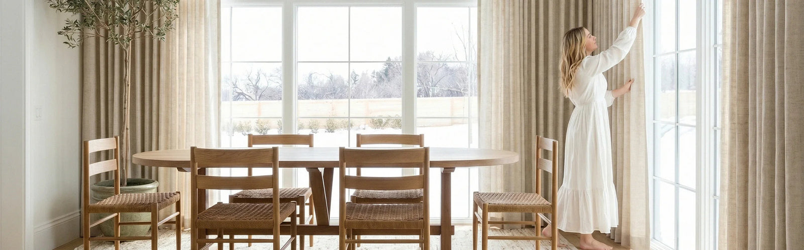 Curtarra custom curtains and Roman shades in a bright living room