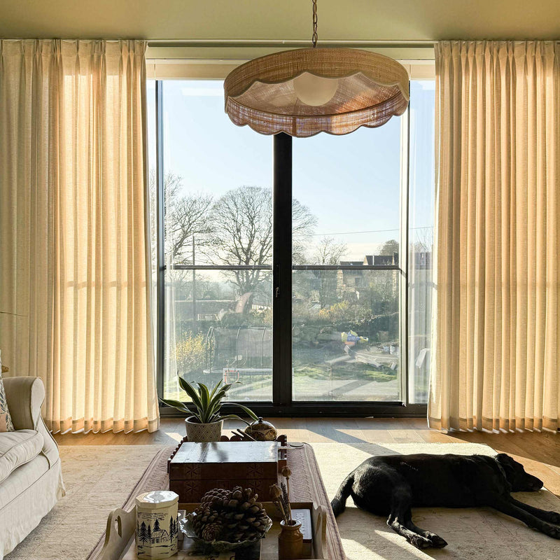 Natural linen curtains in pet-friendly room