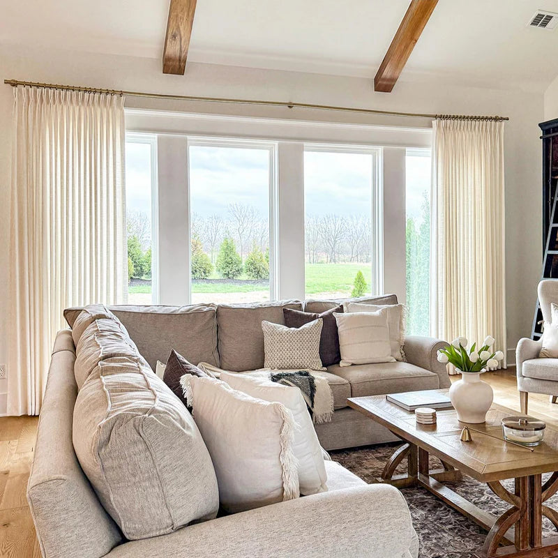 Premium linen blend curtain drape quality in warm taupe interior