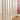 Beige Floral,curtains with a subtle pattern in a room with a pink wall.