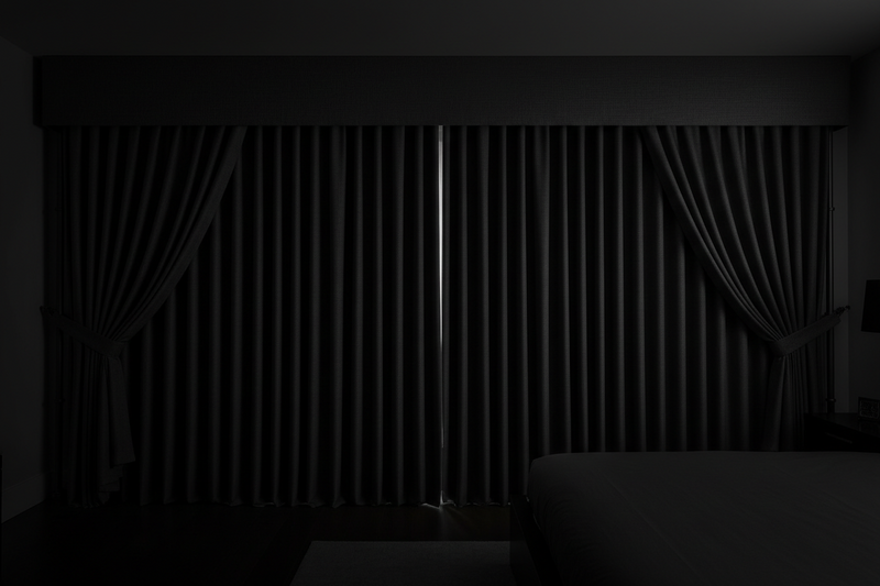 Expert demonstrating blackout curtain installation techniques