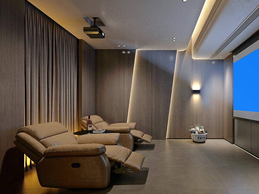 Gary 100% blackout curtains installed ceiling-to-floor with French return rod in a dedicated home theater room