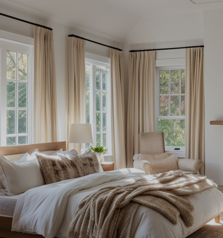 Eleanor Cotton-Blend Textured Curtains, thermal and light-blocking, create a serene, bright bedroom ambiance.