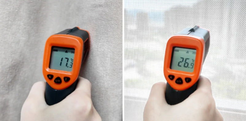 Expert demonstrating proper installation of thermal curtains for heat blocking