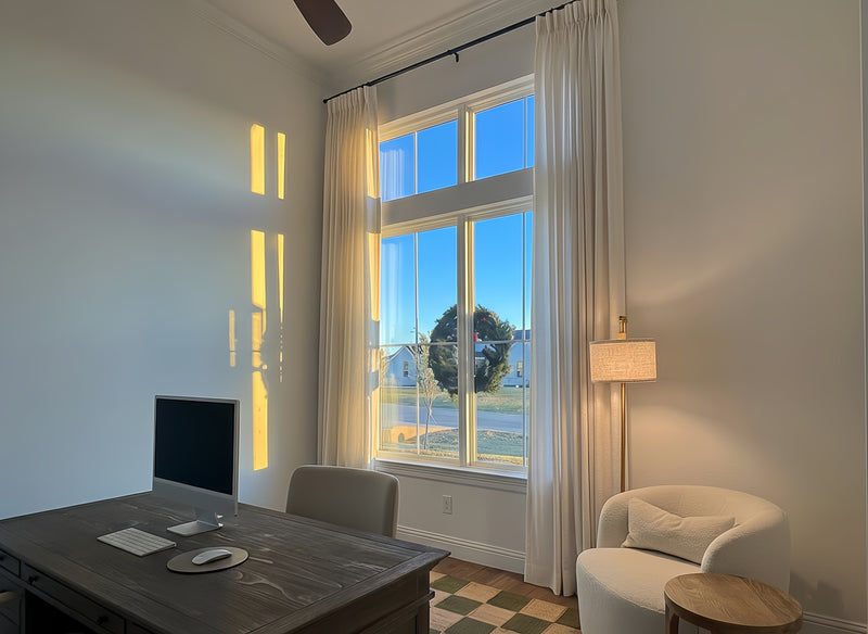 Expert installing home office curtains