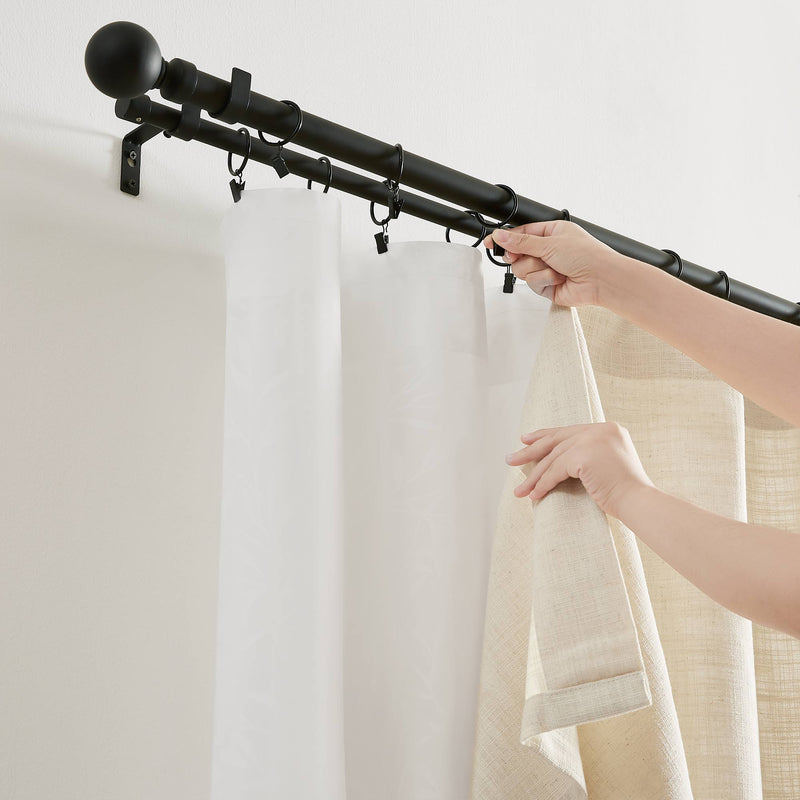 Professional dual-layer window treatments installation with design measurements