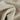 Close-up of beige fabric with folds